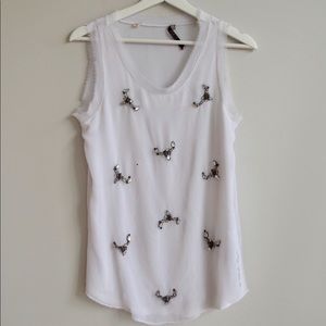 Breezy and light embellished white tank top!