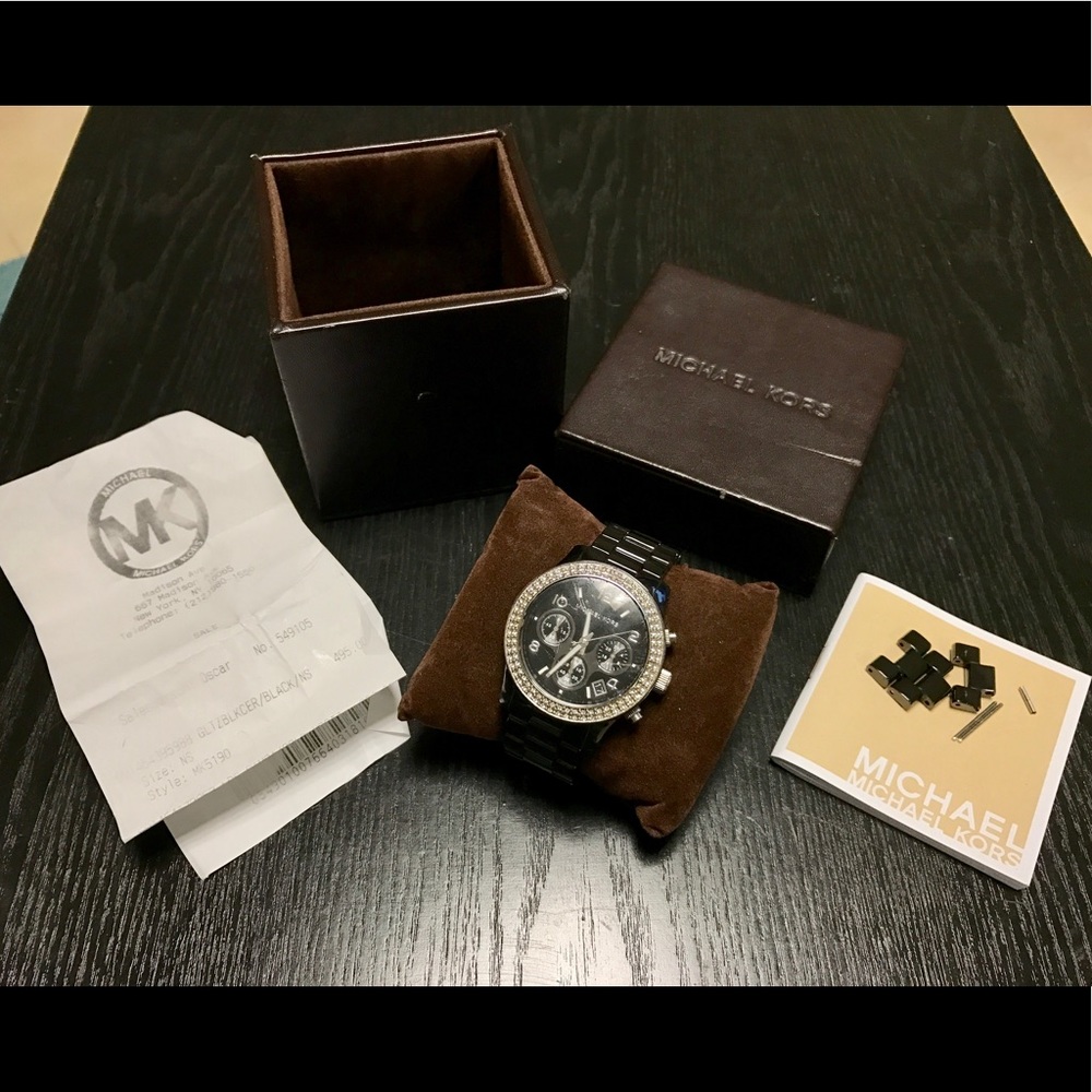 MK 5190 black Chrono blinged out bezel watch.