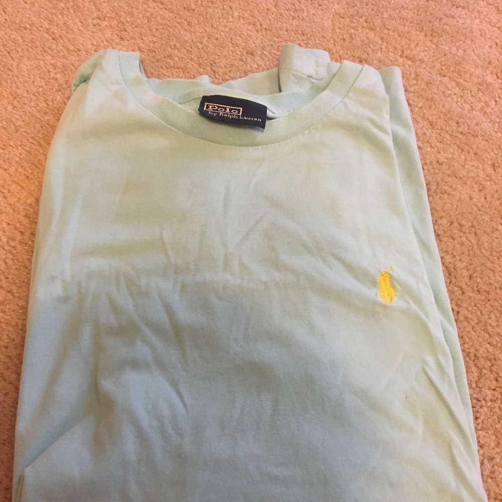 Light blue polo tshirt size M