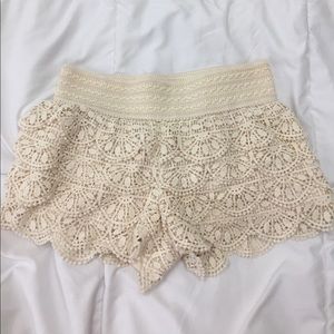 cream ruffle shorts
