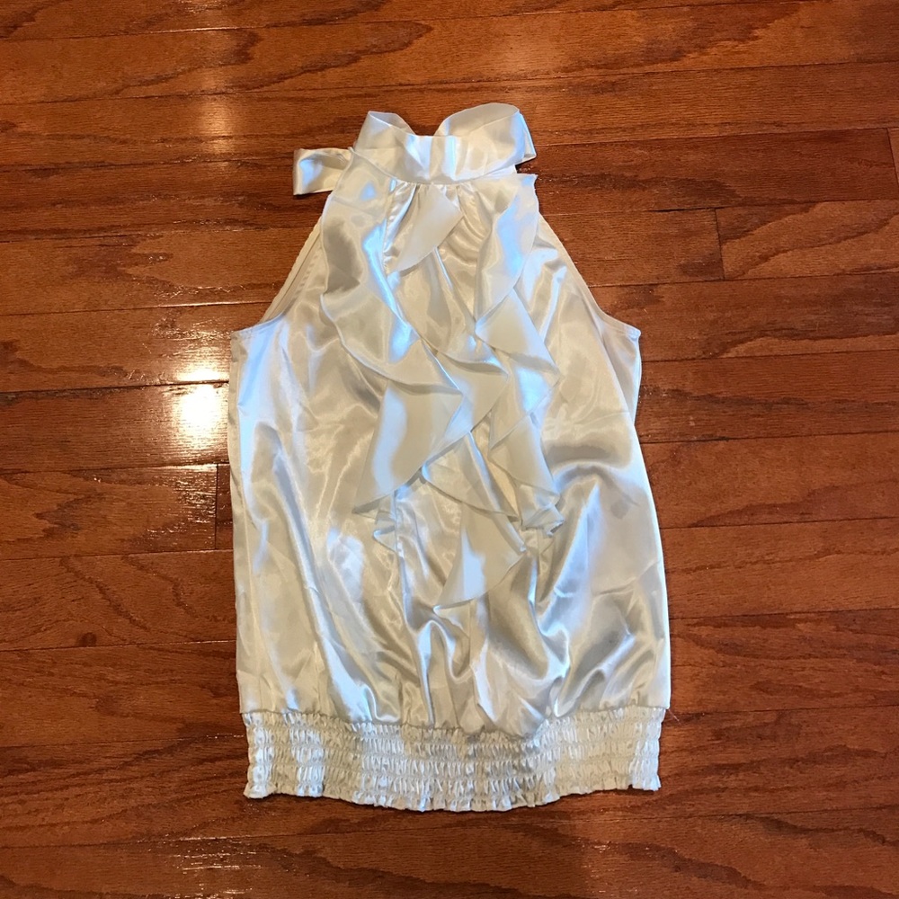The perfect top for that day to night look. Sz M.