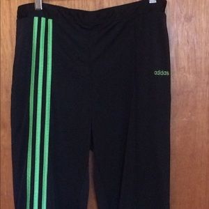 Adidas track pants, green trim and logo on Front