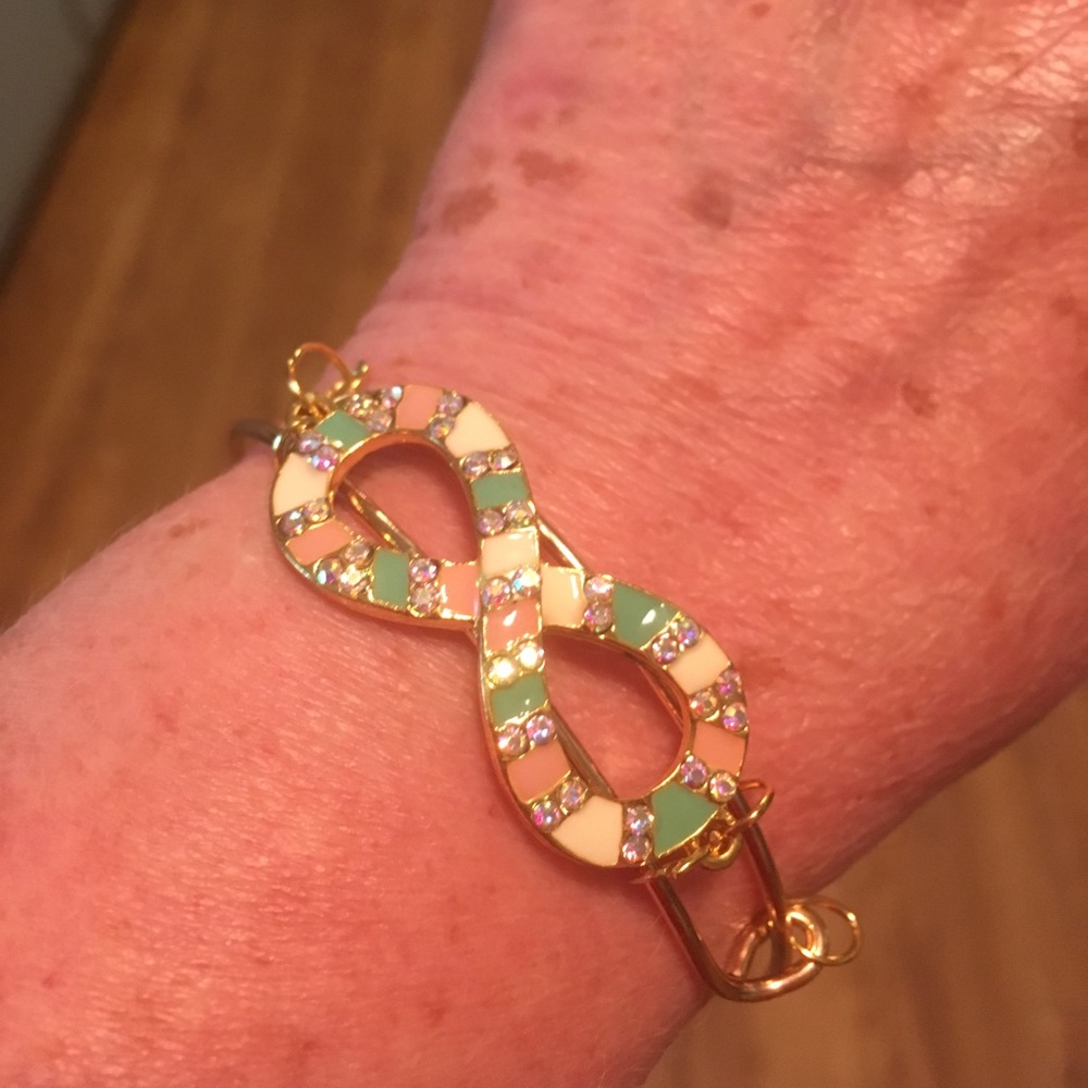 Infinity Enamel over goldtone metal bracelet