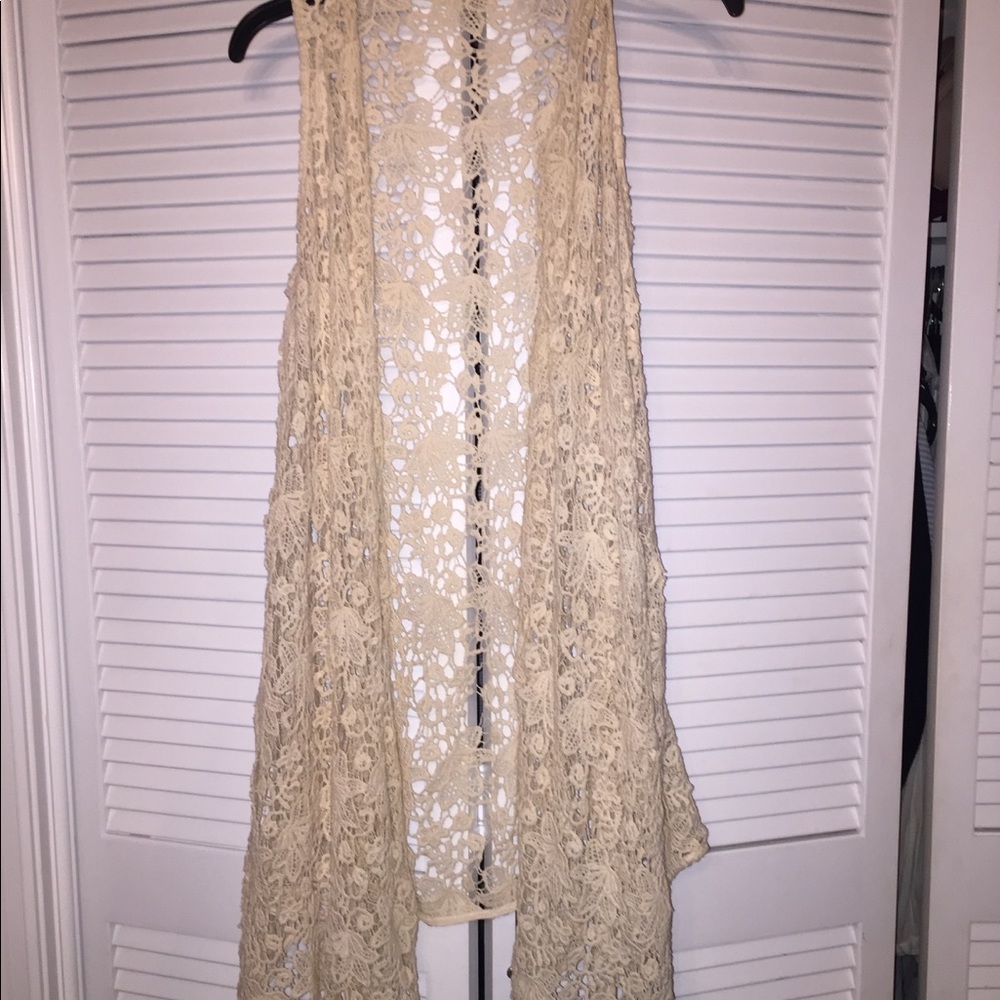 Cream colored crochet vest
