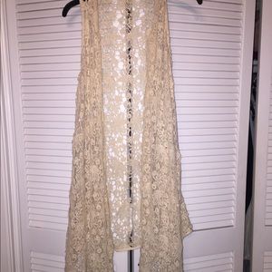 Cream colored crochet vest