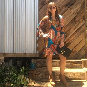 Funky fall multi colored dress wanna sell today