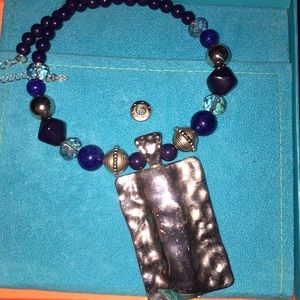 Necklace and two sets of earrings