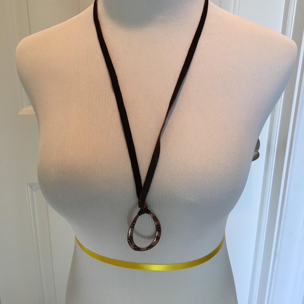 Bronze Pear Shaped Pendant on a Suede Cord