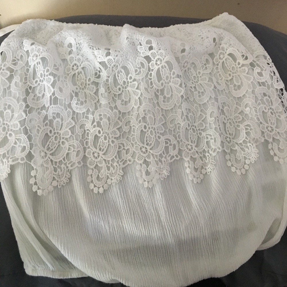 White strapless shirt.