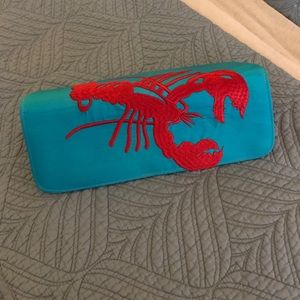 Teal and red satin lobster clutch
