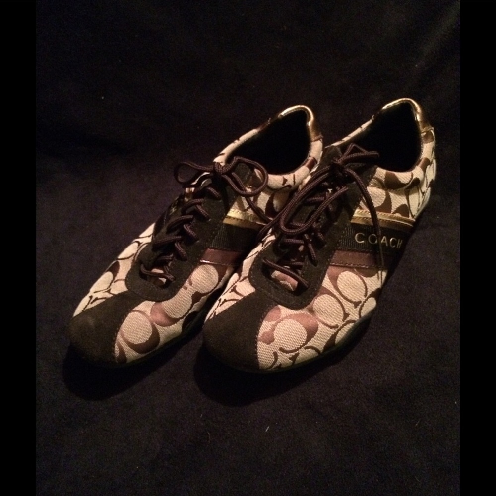 Black and gold Coach tennis shoes