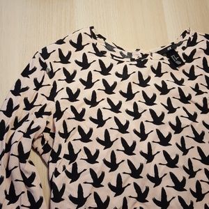 Button back bird print top