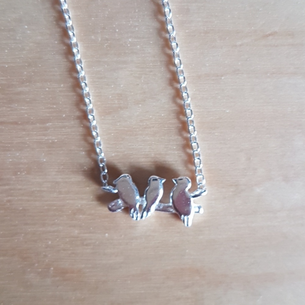 Sterling silver necklace birds on branch.