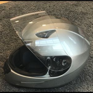 Silver HJC motorcycle helmet