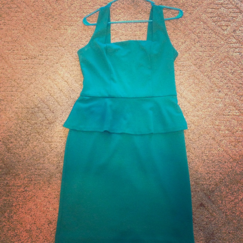 Green peplum dress
