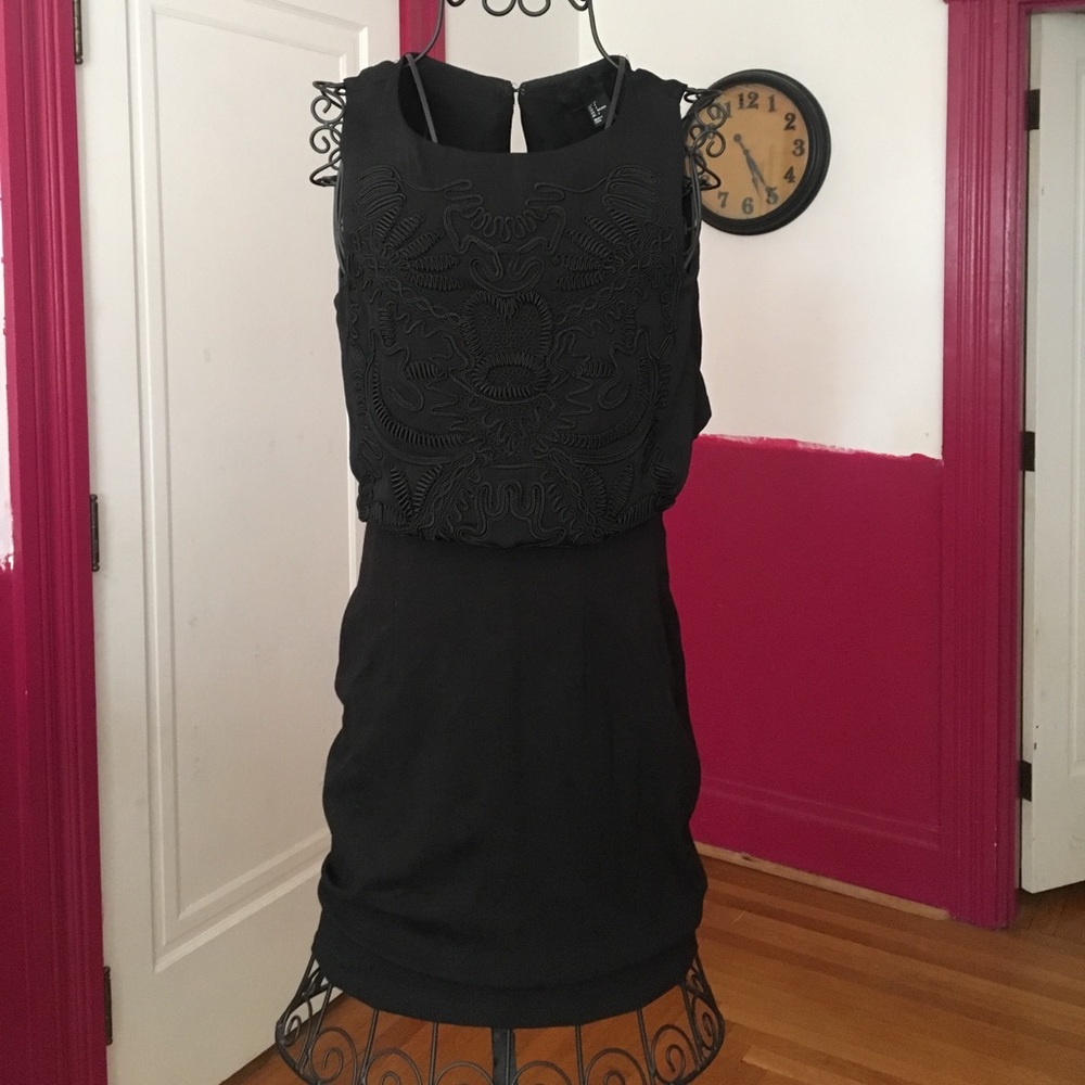 Tighter Black Dress with an open back