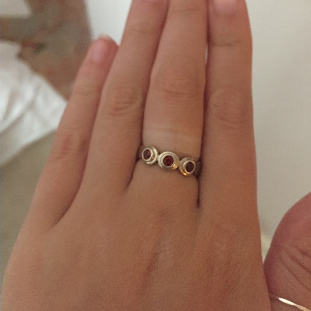 Sterling silver ring with 3 garnet stones