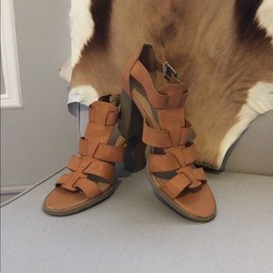 Report tan heeled sandals