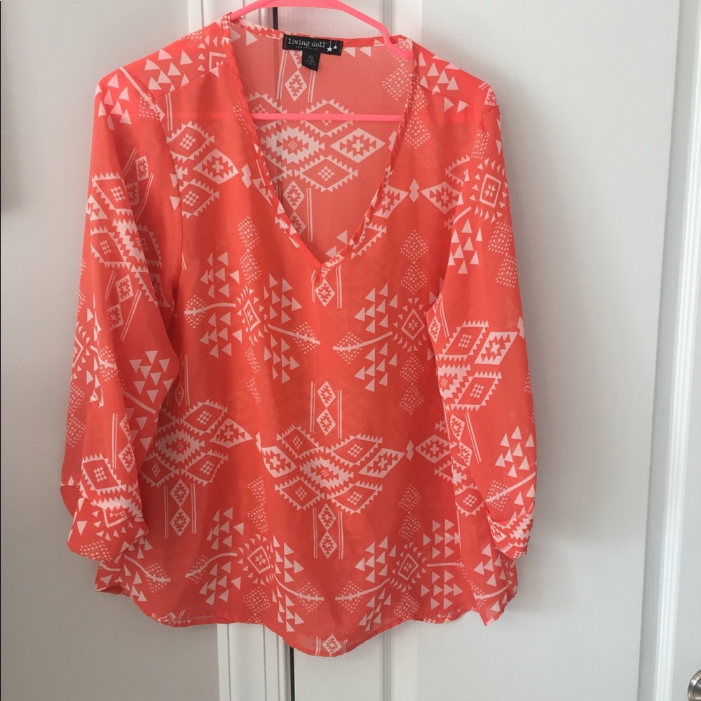 Orange and white tribal print blouse