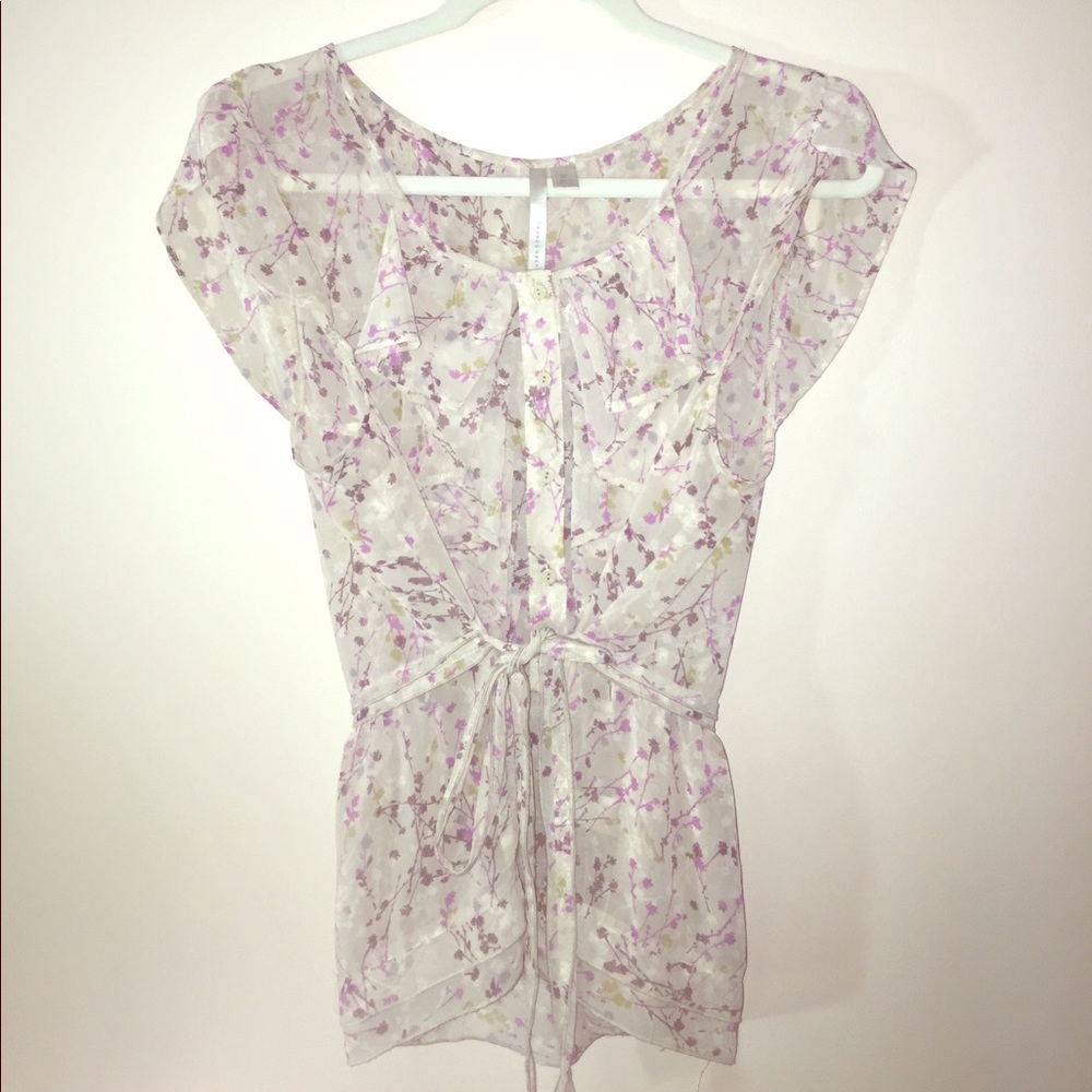 A gray with lavender blouse