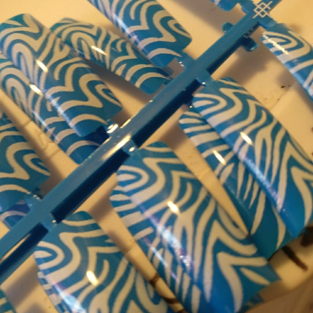 Predesigned nail tip