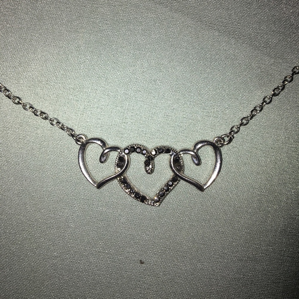 Silver and black stone triple heart necklace