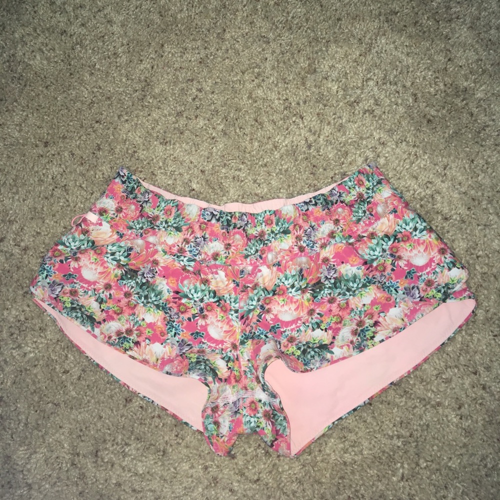 Lululemon Athletica floral surf shorts.