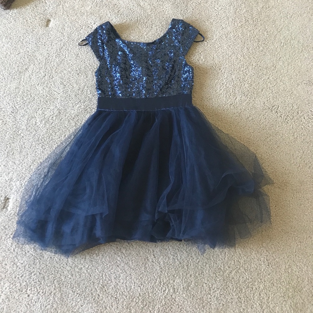 A blue homecoming dress with sparkles at top