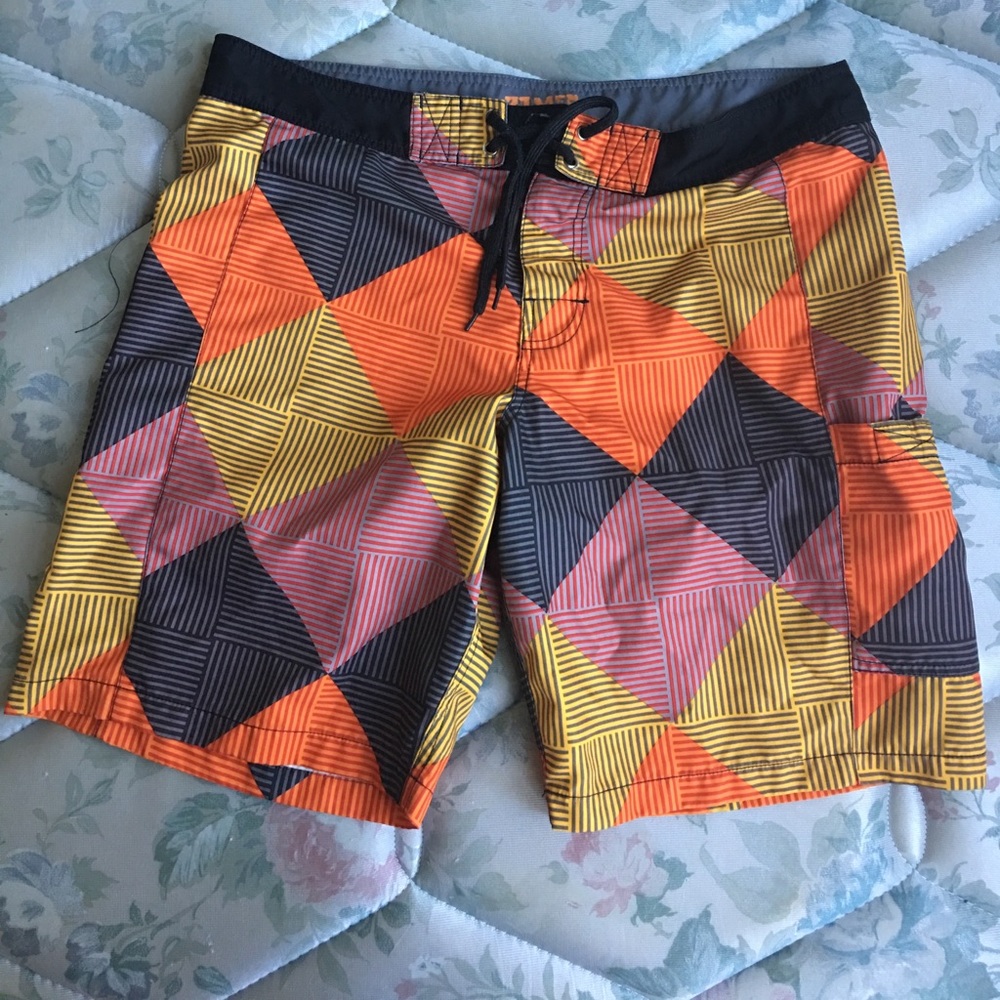 Multicolored design printed swim shorts.