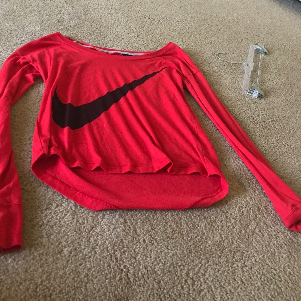 A red Nike shirt