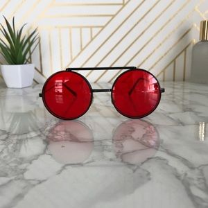 Bright red round frame sunglasses flip up