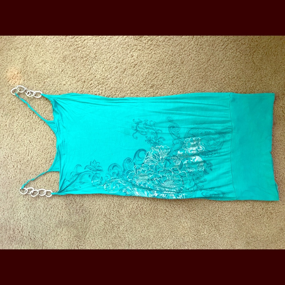Shirt with chain link like straps