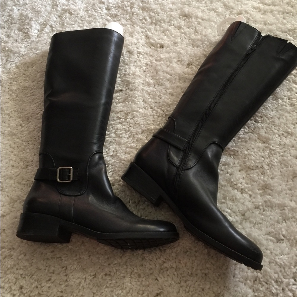 Last chance.   Knee high black leather boots.