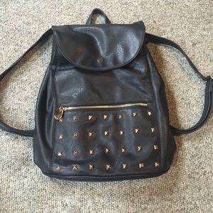 Black faux leather medium sized backpack