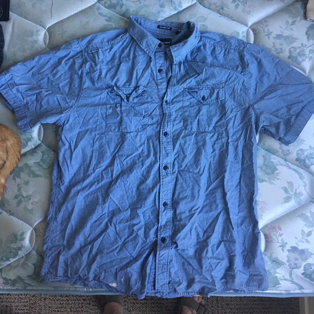 Blue striped button up dress shirt.