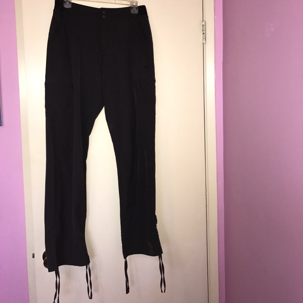 Never-worn, Kathmandu rainproof pants- size 10