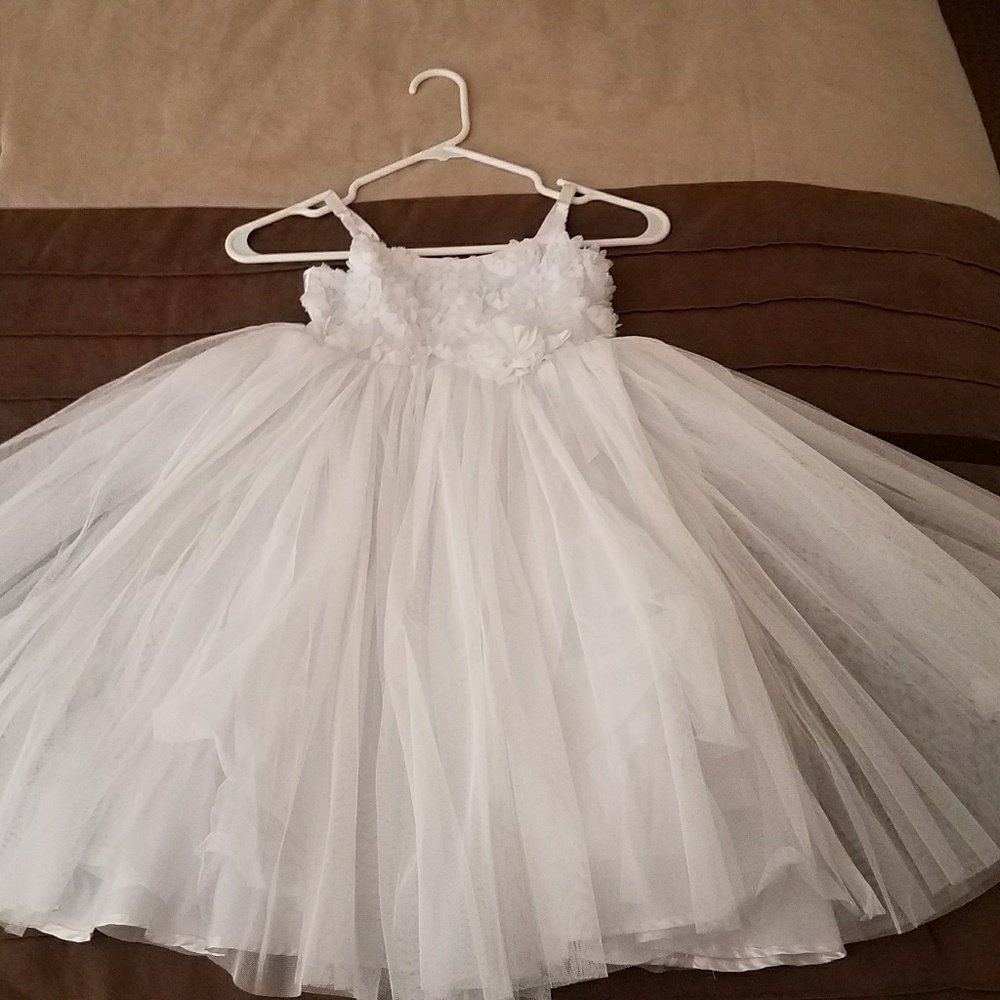 White tulle dress with flower top and ribbon