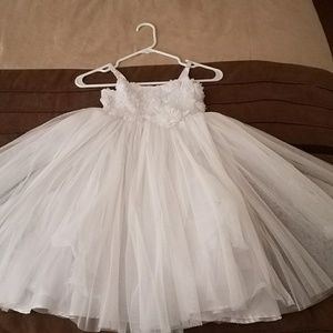 White tulle dress with flower top and ribbon