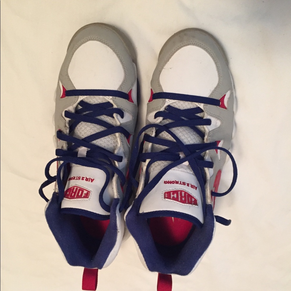 Red, white, gray, and blue Nike