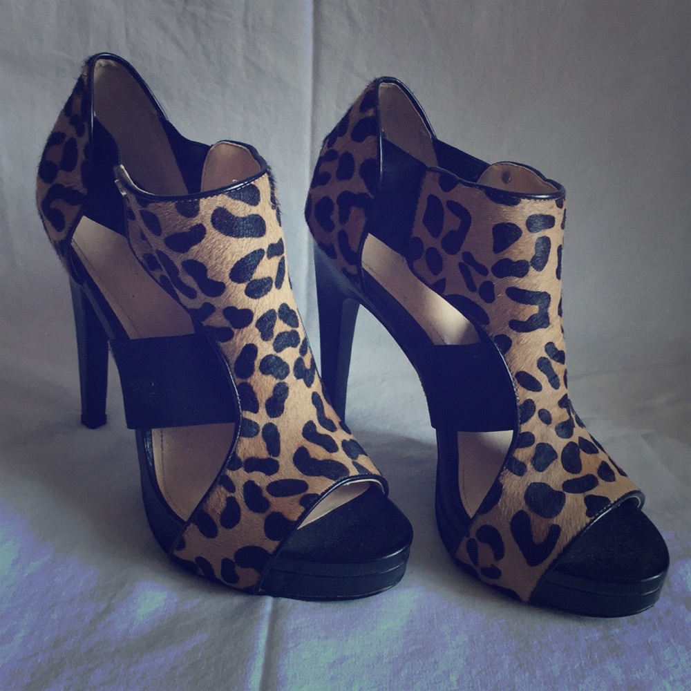 Leather and cheetah platform Calvin Klein sandals.