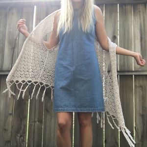 Knit cream color cardigan with fringed bottom