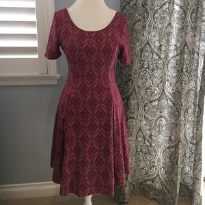 Fit and flare Everly dress. Brocade jersey knit.
