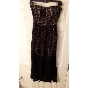 Black open back maxi dress with nude details