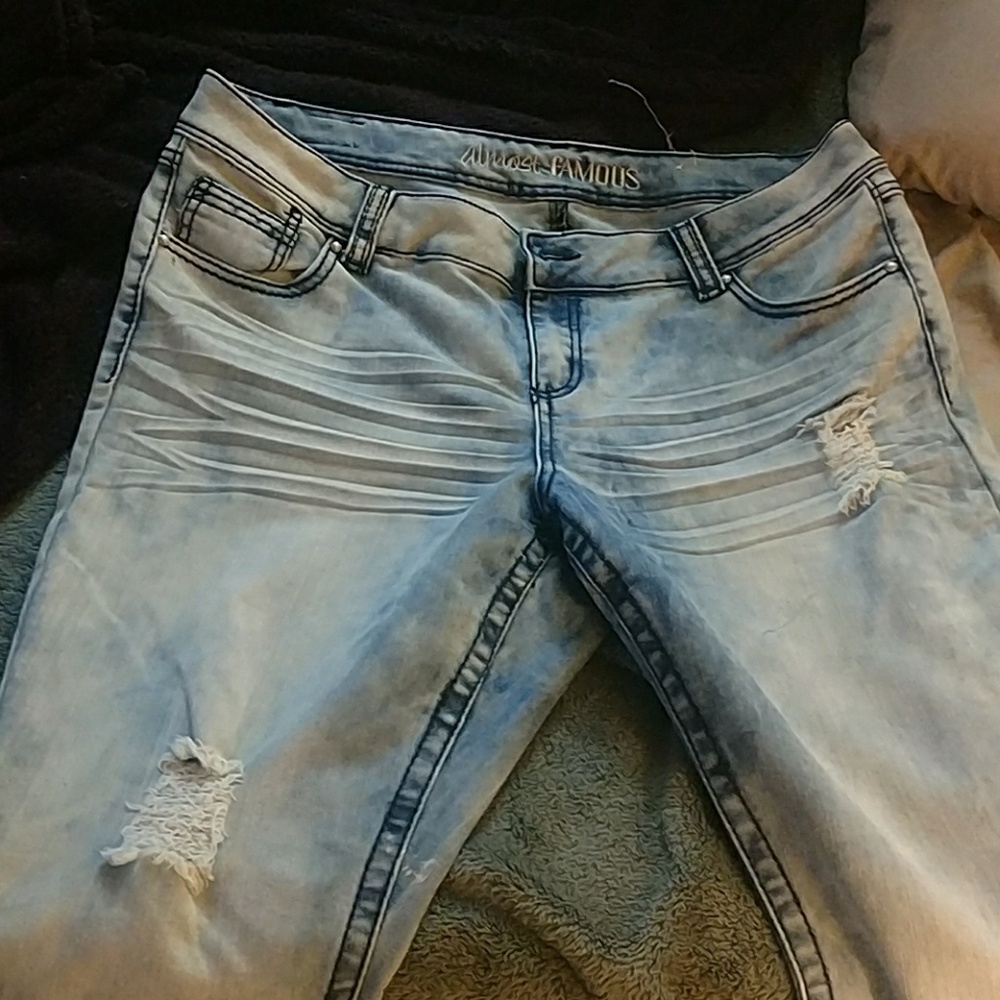 Acid washed distressed jeans