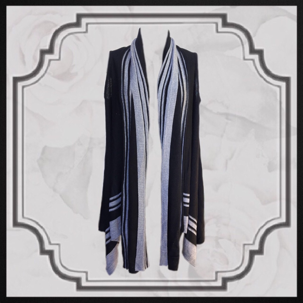 Sweet Sinammon sleeveless cardigan.