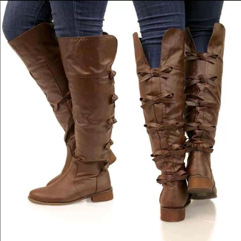 Brown bow riding boots