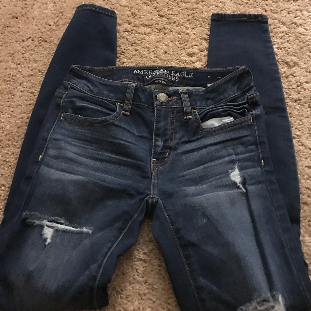 * ON HOLD *Dark wash distressed skinny jeggings