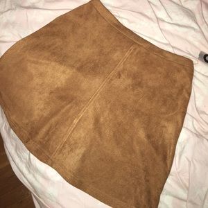 Tan suede skirt.