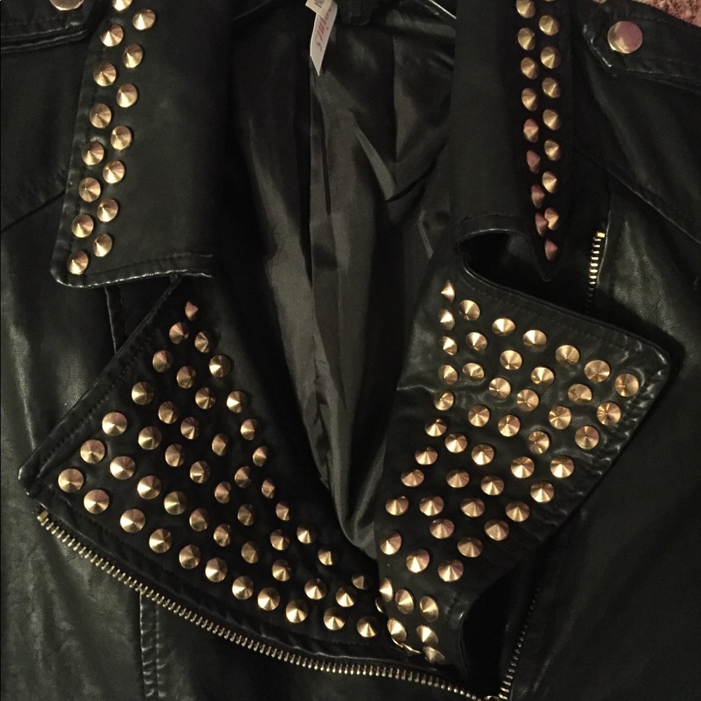Gold studded leather jacket