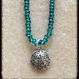 Sand dollar beaded necklace